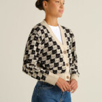 Cardigan Kanan Pepita Cats oat white von Dedicated. Cardigan Kanan Pepita Cats oat white von Dedicated.