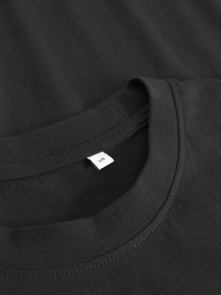 T-shirt Stockholm Small Paper Cut Bike black von Dedicated.